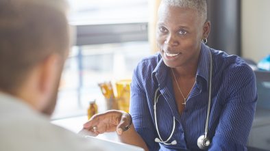 A female doctor is talking with a patient as a part of b-roll for her marketing videos.